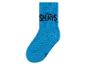Des chaussettes bleues avec le logo des Schtroumpfs.
