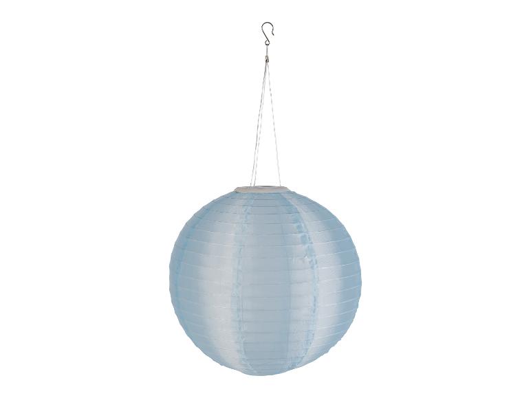 Lanterne solaire ronde bleue suspendue, décoration extérieure.