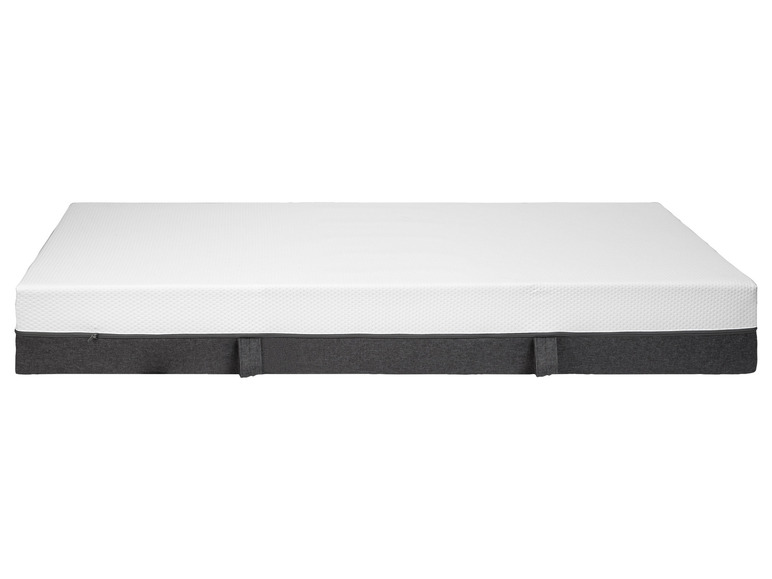 Un matelas blanc avec une housse grise.