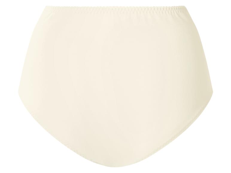 Culotte taille haute couleur crème avec une ceinture côtelée subtile.