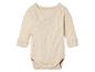 Un body bébé beige à manches longues.