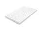 Matelas blanc avec surface texturée et étiquette orange sur le côté.