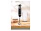 Mixeur plongeant SilverCrest 600 W sur un plan de travail en bois.
