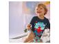Enfant dans son lit, portant un pyjama pour enfants LUPILU® Spider-Man.