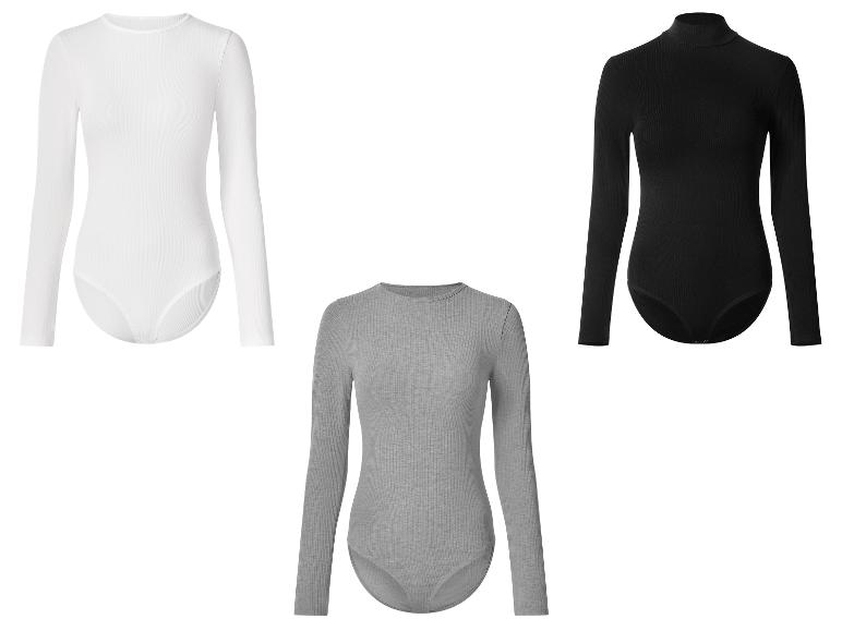 Trois bodys à manches longues pour femmes en blanc, gris et noir.