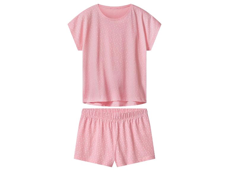 Pyjama femme rose à pois blancs, composé d'un t-shirt et d'un short.