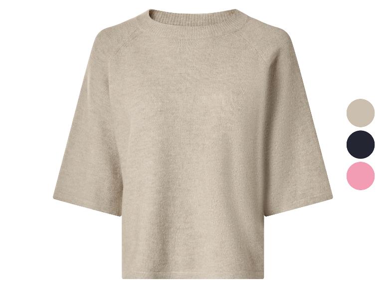 Pull en maille beige à manches courtes et col rond, avec des échantillons de couleur.