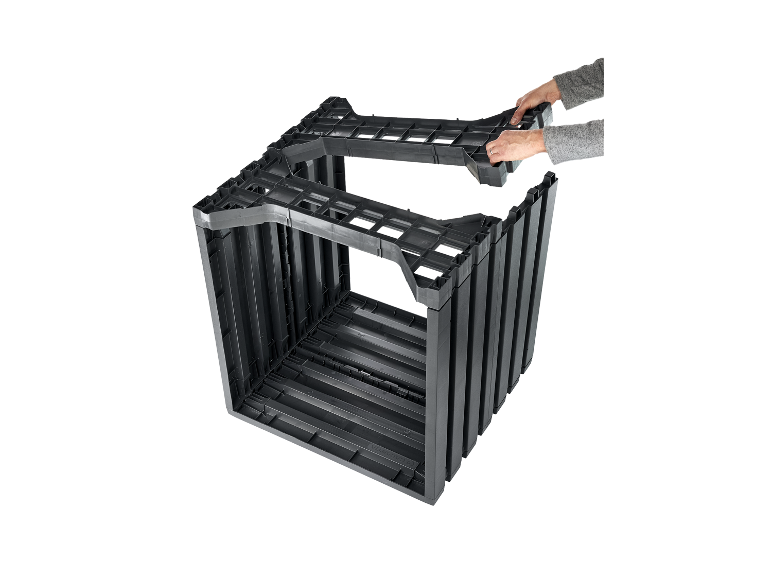 Montage d'un composteur en plastique modulaire.