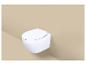 Toilettes blanches suspendues sur fond beige