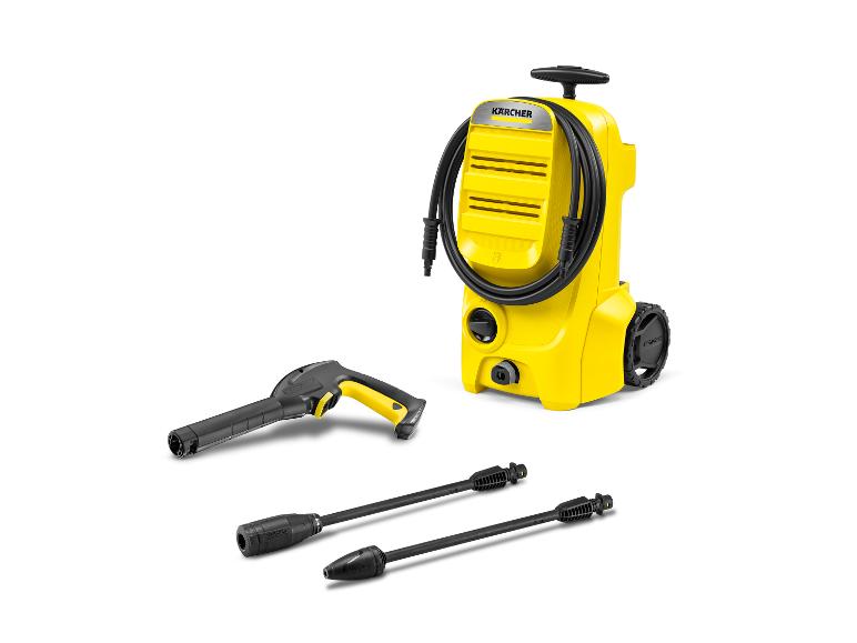 Nettoyeur haute pression jaune avec tuyau, pistolet et deux buses.