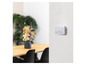 Un détecteur de fumée Smartwares monté au mur.
