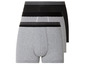 Trois boxers : gris, noir et rayés
