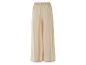 Pantalon large beige à taille élastique.