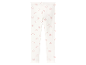 Leggings blanches pour enfants avec des cœurs roses.