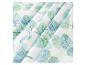 Tissu textile à motifs de feuilles bleues et vertes.