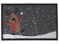 Paillasson de Noël avec un renne joyeux dans la neige.