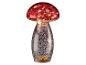 Lampe champignon rouge avec pied argenté moucheté.