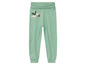 Pantalon de jogging vert avec un imprimé d'oiseau.