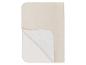 Alèse beige imperméable avec envers absorbant.