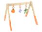 Portique d'éveil en bois pour bébé avec jouets en peluche suspendus : citrouille, fleur et dinosaure.
