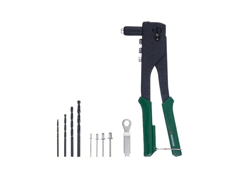 Pistolet à riveter avec forets, rivets et clé.