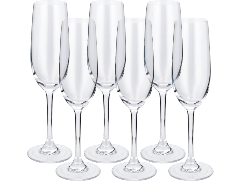 Six flûtes à champagne en verre transparent sur fond noir.
