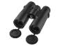 Jumelles noires avec capuchons d'objectif ouverts sur fond blanc
