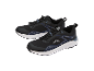 Une paire de chaussures de randonnée noires et bleues avec des lacets élastiques et le mot 'WATERPROOF'.