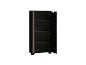 Armoire noire avec une porte ouverte révélant des étagères et un panneau décoratif en bois.