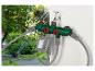 Un arroseur de jardin Parkside avec minuterie et trois sorties.