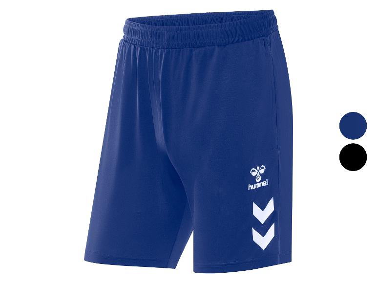 Short de sport Hummel avec imprimé chevron blanc.