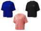 Trois t-shirts Crivit de couleurs différentes.