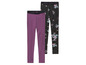 Deux paires de leggings : un leggings uni violet et un leggings noir à fleurs.