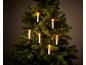Sapin de Noël avec bougies allumées.