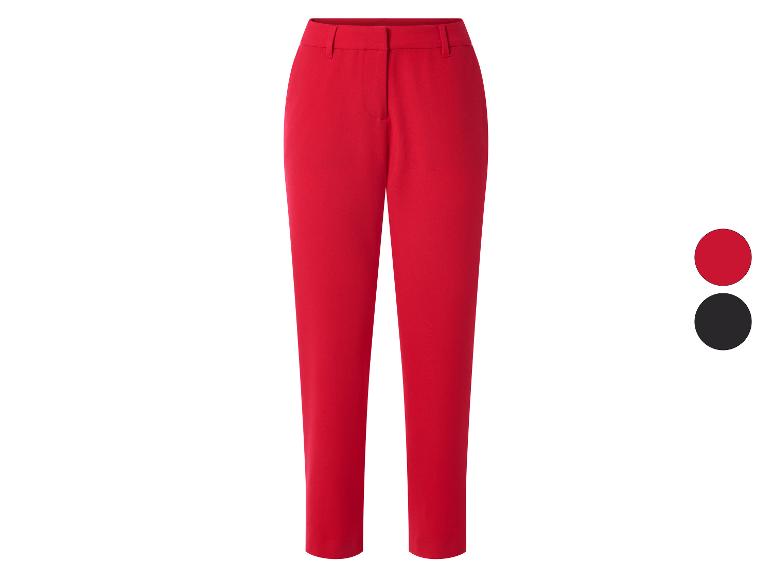 Pantalon femme rouge taille haute, également disponible en noir.