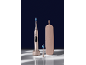 Brosse à dents électrique rose avec station de charge, tête de rechange et étui de voyage.