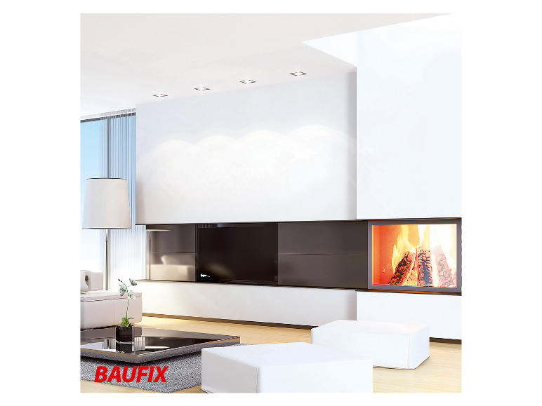 Cheminée, meubles modernes et éclairage encastré Baufix dans un salon élégant.