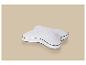 Oreiller ergonomique blanc avec bordure noire sur fond beige