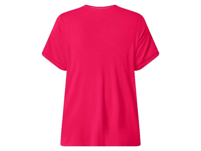 T-shirt femme fuchsia à manches courtes avec encolure ronde et détails ajourés.