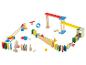 Jouets en bois pour construire des pistes de billes, y compris des dominos et des rampes.