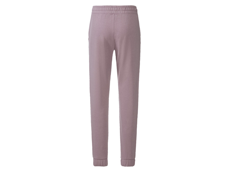 Pantalon de survêtement de couleur lilas clair.