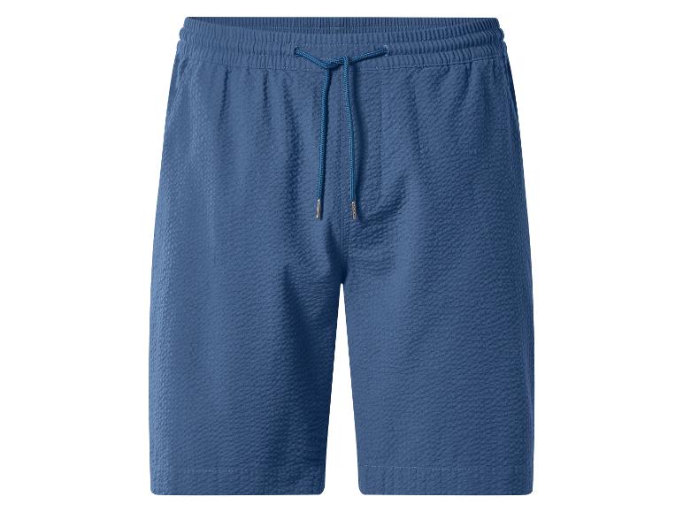 Short texturé bleu pour homme avec taille élastiquée et cordon de serrage.