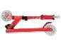 Trottinette rouge pour enfant avec roues lumineuses.