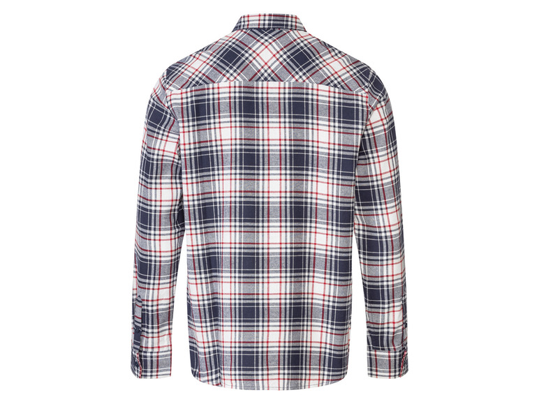 Une chemise à carreaux à manches longues en bleu marine, rouge et blanc.