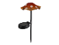 Un luminaire de jardin solaire en forme de champignon.