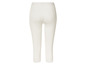 Leggings blanches avec dentelle en bas.