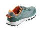 Chaussures Crivit vert foncé avec des détails orange.