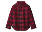 Chemise à carreaux rouges et noirs à manches longues avec boutons.