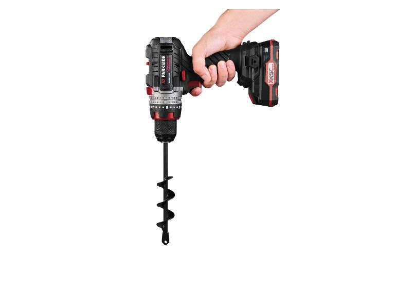 Une perceuse-visseuse sans fil Parkside avec un foret pour terre.