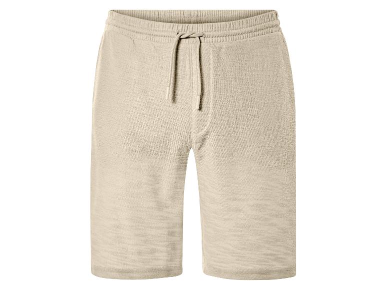 Short beige avec cordon de serrage.
